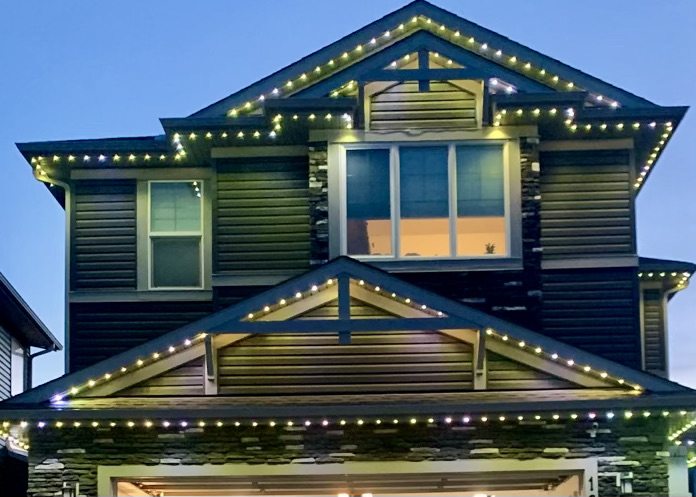 Craftsman home teal roofline